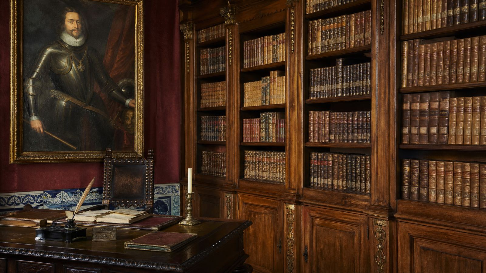 Palace library with a portrait of a nobleman in armour